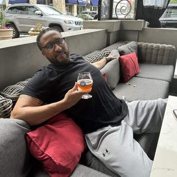 Ebb & Flow - Patio area and IPA (Beer) - Cocktail Bars Near Me - Plano, Texas