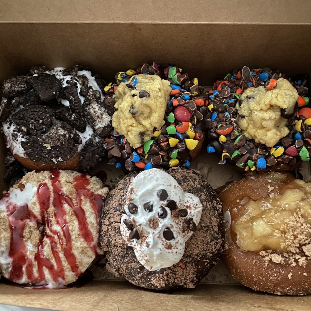 Circles on the Square - Top row left to right: Oreo, 2 monster cookie dough Bottom row: raspberry strudel, Hot coco, Caramel Apple Pie - Donuts Near Me - Medina, Ohio