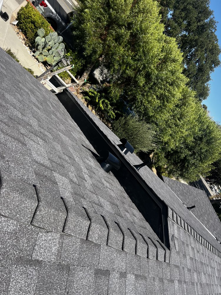 Slide of Kayhan's Roofing