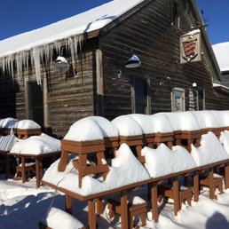 snow covered tables and benches snow covered tables and benches