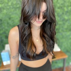 Sincerely Saige - Beautiful deep brown color with a pop of orange! Done by our stylist Kayla!