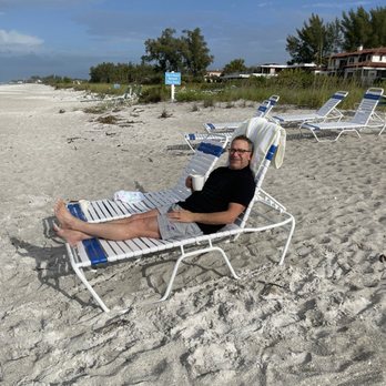Silver Sands Gulf Beach Resort - My hubby enjoying the beach in the morning - Hotels Near Me - Longboat Key, Florida Silver Sands Gulf Beach Resort - My hubby enjoying the beach in the morning - Hotels Near Me - Longboat Key, Florida