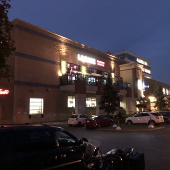 La Cage - cars parked in front of a building at night - Sports Bars Near Me - Montreal, Quebec La Cage - cars parked in front of a building at night - Sports Bars Near Me - Montreal, Quebec