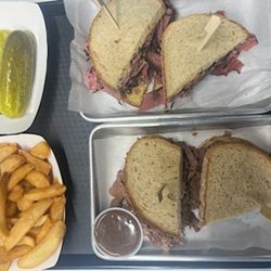 Brisket, pastrami, french fries and pickles