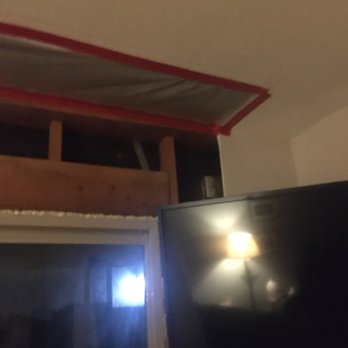 Zona Restoration - Ceiling and wall being fixed - Damage Restoration Near Me - Tempe, Arizona