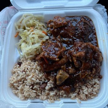 Island Cuisine - Stew chicken, rice & peas and cabbage - Caribbean Near Me - Charlotte, North Carolina Island Cuisine - Stew chicken, rice & peas and cabbage - Caribbean Near Me - Charlotte, North Carolina