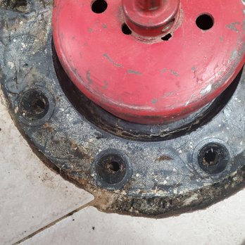J&F Plumbing Services - Hole saw was used to remove the cracked flange. - Plumbing Near Me