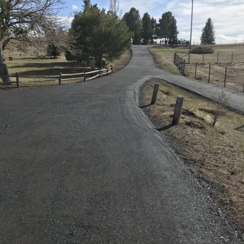 Pro Grade Asphalt - a paved road in a rural area - General Contractors Near Me Pro Grade Asphalt - a paved road in a rural area - General Contractors Near Me