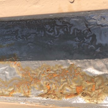 McPartlon Roofing - Failure to clean surface before applying membrane that would not crack. Obviously it did! - Roofing Near Me - Santa Fe, New Mexico