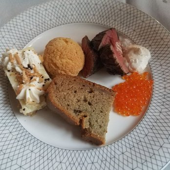 Maple & Ash - Banana bread, coconut cream cake, cream puff (with lime flavor), filet mignon, caviar/roe. - Steakhouses Near Me - Chicago, Illinois Maple & Ash - Banana bread, coconut cream cake, cream puff (with lime flavor), filet mignon, caviar/roe. - Steakhouses Near Me - Chicago, Illinois
