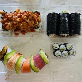 Aloha Sushi - Dynamite roll, a few hand rolls, rainbow maki and cucumber maki - Sushi Bars Near Me - Honolulu, Hawaii