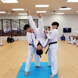 Tigers Martial Arts Group - Back flip practice with members of the Yong-In University Demonstration Team