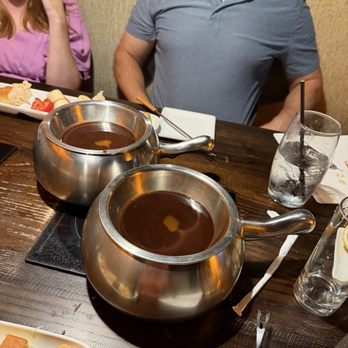 The Melting Pot - Not one, but two pots of Flaming Turtle chocolate fondue - Fondue Near Me - Glendale, Arizona The Melting Pot - Not one, but two pots of Flaming Turtle chocolate fondue - Fondue Near Me - Glendale, Arizona