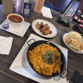 La Cueva del Mar - Arroz Con Jueyes / Crabmeat Rice, habichuelas, amarillos, y tacos de mahi mahi - Puerto Rican Near Me - San Juan, Puerto Rico La Cueva del Mar - Arroz Con Jueyes / Crabmeat Rice, habichuelas, amarillos, y tacos de mahi mahi - Puerto Rican Near Me - San Juan, Puerto Rico