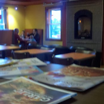 Boston Bay Pizza - Interior - fireplace on the far wall - Pizza Near Me - Chicopee, Massachusetts