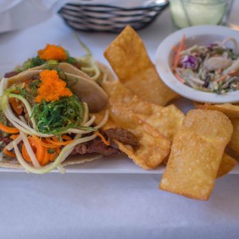 Dajio - Asian fish tacos (with fried bluefish), fried wontons, and Doug's excellent slaw. - Seafood Near Me - Ocracoke, North Carolina Dajio - Asian fish tacos (with fried bluefish), fried wontons, and Doug's excellent slaw. - Seafood Near Me - Ocracoke, North Carolina