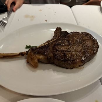 21 Main At North Beach - Tomahawk Ribeye* - Steakhouses Near Me - North Myrtle Beach, South Carolina