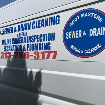 Root Masters Sewer Repair & Cleaning - One of their business trucks. - Excavation Services Near Me Root Masters Sewer Repair & Cleaning - One of their business trucks. - Excavation Services Near Me