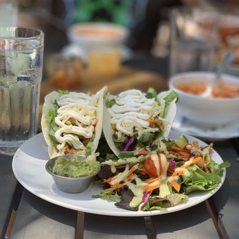 Catch 27 - Fish tacos with house salad and a side of guacamole. - Southern Near Me - Saint Augustine, Florida