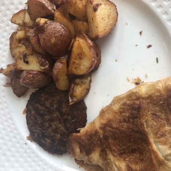 Stripers Waterside Restaurant - Egg and cheese on croissant with home fries - Seafood Near Me - Kennebunkport, Maine