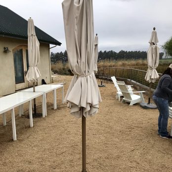 Wrath Wines - Cute patio - right before it started raining - Wineries Near Me - Soledad, California Wrath Wines - Cute patio - right before it started raining - Wineries Near Me - Soledad, California