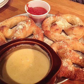 Mellow Mushroom Charlottesville - Garlic butter and parmesan pretzels with beer cheese dip! - Pizza Near Me - Charlottesville, Virginia