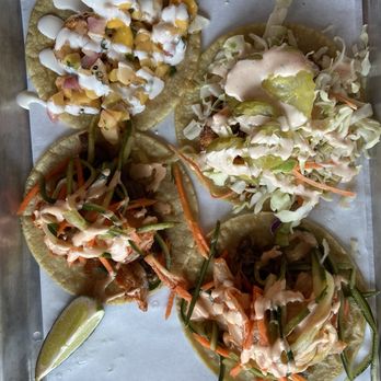 Masa Masa - Korean tacos (bulgogi) - bottom 2 Nashville chicken (breaded) - top right Grilled shrimp - top left - Tacos Near Me - Roseville, California Masa Masa - Korean tacos (bulgogi) - bottom 2 Nashville chicken (breaded) - top right Grilled shrimp - top left - Tacos Near Me - Roseville, California