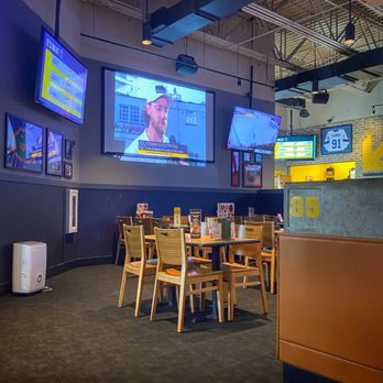Buffalo Wild Wings - Partial view of seating and televisions - American Near Me - Oldsmar, Florida Buffalo Wild Wings - Partial view of seating and televisions - American Near Me - Oldsmar, Florida