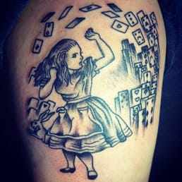 Love my Alice in a Wonderland tattoo. Emily is the best!