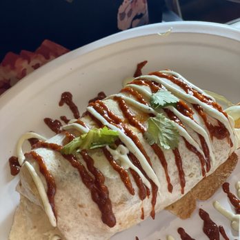 Nomads - One of their breakfast burritos - New American Near Me - Fayetteville, Arkansas Nomads - One of their breakfast burritos - New American Near Me - Fayetteville, Arkansas