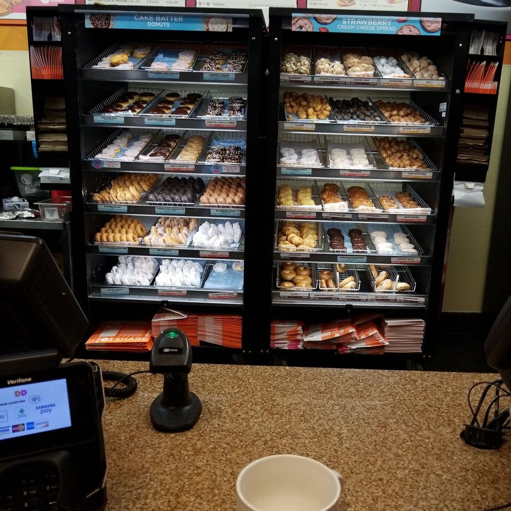  a display of donuts in a bakery