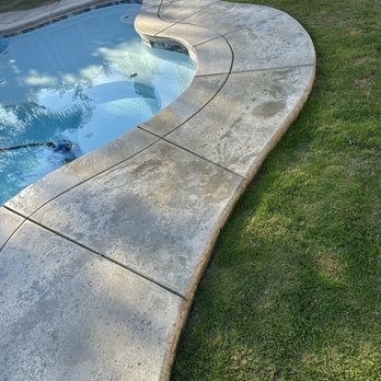 Rock Bottom Pools & Landscape - a pool with a stone edge - Landscaping Near Me - Bakersfield, California Rock Bottom Pools & Landscape - a pool with a stone edge - Landscaping Near Me - Bakersfield, California