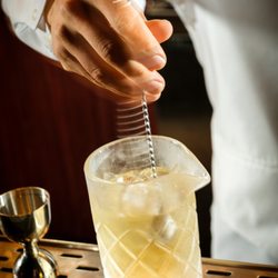 Chandelier Bar - Savor Sushi and signature cocktails, served beneath the radiant aura of our famous Czechoslovakian crystal centerpiece.