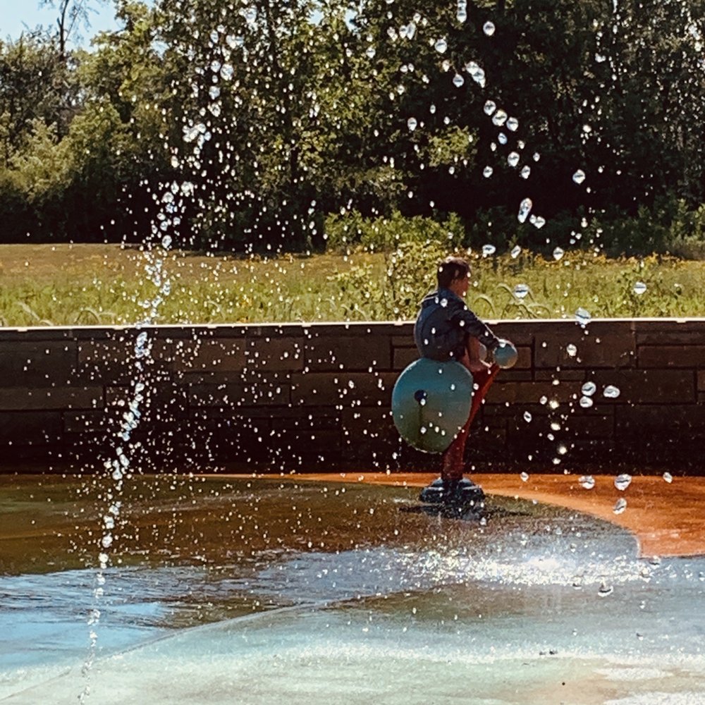 When it's hot outside...you go to a splash pad!