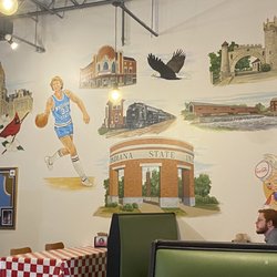 Greek's Pizzeria - Interior ISU themed wall.