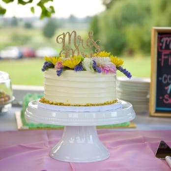 Karl's Bakery & Cafe - Eight inch round pink champagne cake with strawberry filling and cream cheese frosting that we cut for our wedding. - Bakeries Near Me - Everett, Washington Karl's Bakery & Cafe - Eight inch round pink champagne cake with strawberry filling and cream cheese frosting that we cut for our wedding. - Bakeries Near Me - Everett, Washington