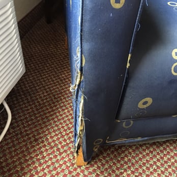 American Inn & Suites - Shredded chair - Hotels Near Me - Dewitt, Michigan