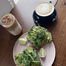 Vanilla latte and a cold brew with a side of avocado toast Vanilla latte and a cold brew with a side of avocado toast