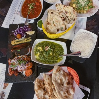 Holi Indian Kitchen - Dahi Puri, Bang Bang Potatoes, Paneer Saag, Veggie Vindaloo, Surti Gotala, Butter Pan, Garlic pan, and Chicken Tikka Tandaori Dawat. - Indian Near Me - Miramar Beach, Florida Holi Indian Kitchen - Dahi Puri, Bang Bang Potatoes, Paneer Saag, Veggie Vindaloo, Surti Gotala, Butter Pan, Garlic pan, and Chicken Tikka Tandaori Dawat. - Indian Near Me - Miramar Beach, Florida