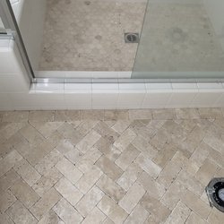 Octavio Chavez Granite Tile & Marble - Bathroom shower pan and herringbone floors throughout