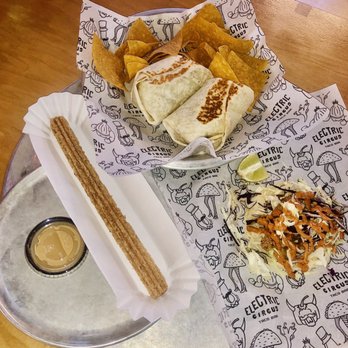 Electric Circus Taco Bar - Dulce de leche churro, super smash bra burrito, smashville hot chicken taco - Tacos Near Me - Williamsburg, Virginia Electric Circus Taco Bar - Dulce de leche churro, super smash bra burrito, smashville hot chicken taco - Tacos Near Me - Williamsburg, Virginia
