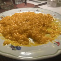 This was supposed to be Risotto with butter and cheese sauce. It was disgusting.