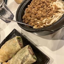 Beef Pancake Roll $8.99
Dan Dan Noodle $13.99 (usually comes with green onions and maybe cilantro) Beef Pancake Roll $8.99
Dan Dan Noodle $13.99 (usually comes with green onions and maybe cilantro)