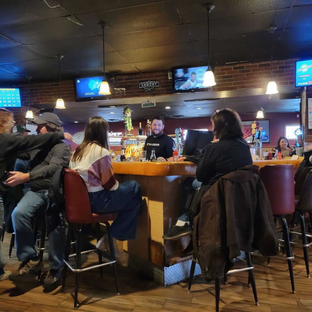 Harry's Place - Bar area at Harry's Place with Matt at the helm. - Pubs Near Me - Lansing, Michigan Harry's Place - Bar area at Harry's Place with Matt at the helm. - Pubs Near Me - Lansing, Michigan