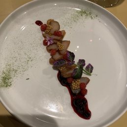 Cured smoked rabbit loin, black and red currant, pickled mustard seeds Cured smoked rabbit loin, black and red currant, pickled mustard seeds