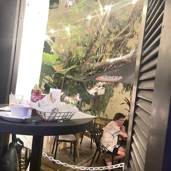 Marilyn's Place - Front table with street view - Bars Near Me - Old San Juan, Puerto Rico Marilyn's Place - Front table with street view - Bars Near Me - Old San Juan, Puerto Rico