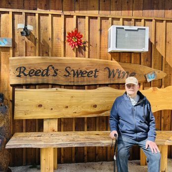 Reed's Sweet Wine - Papa in front of the Wine Store. - Wineries Near Me - Tacoma, Washington Reed's Sweet Wine - Papa in front of the Wine Store. - Wineries Near Me - Tacoma, Washington