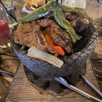 Vidorra - TABLITAS EN FUEGO: 1 Lb of Hickory Grilled Chipotle-Citrus Marinated Beef Short Ribs, Fajita Veggies, Garlic Butter - Mexican Near Me - Dallas, Texas Vidorra - TABLITAS EN FUEGO: 1 Lb of Hickory Grilled Chipotle-Citrus Marinated Beef Short Ribs, Fajita Veggies, Garlic Butter - Mexican Near Me - Dallas, Texas