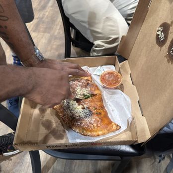 Spaghetti Western Italian Cafe - My friend had to cut the calzone with a plastic knife. lol - Italian Near Me - Houston, Texas Spaghetti Western Italian Cafe - My friend had to cut the calzone with a plastic knife. lol - Italian Near Me - Houston, Texas