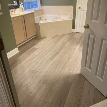 Kruper Flooring & Design - Bathroom vinyl plank over tile. - Flooring Near Me Kruper Flooring & Design - Bathroom vinyl plank over tile. - Flooring Near Me